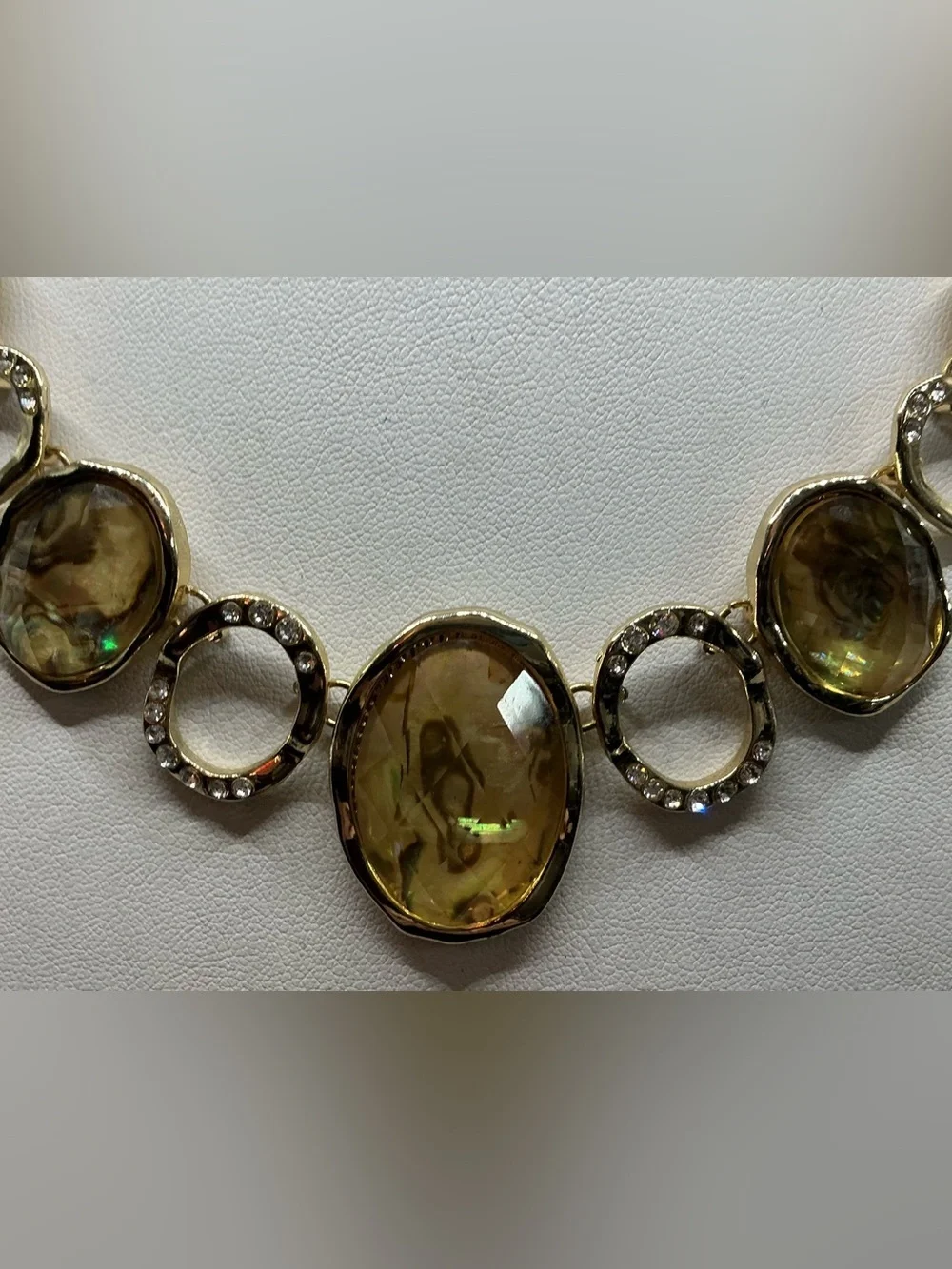 Dana Buchman elegant gold